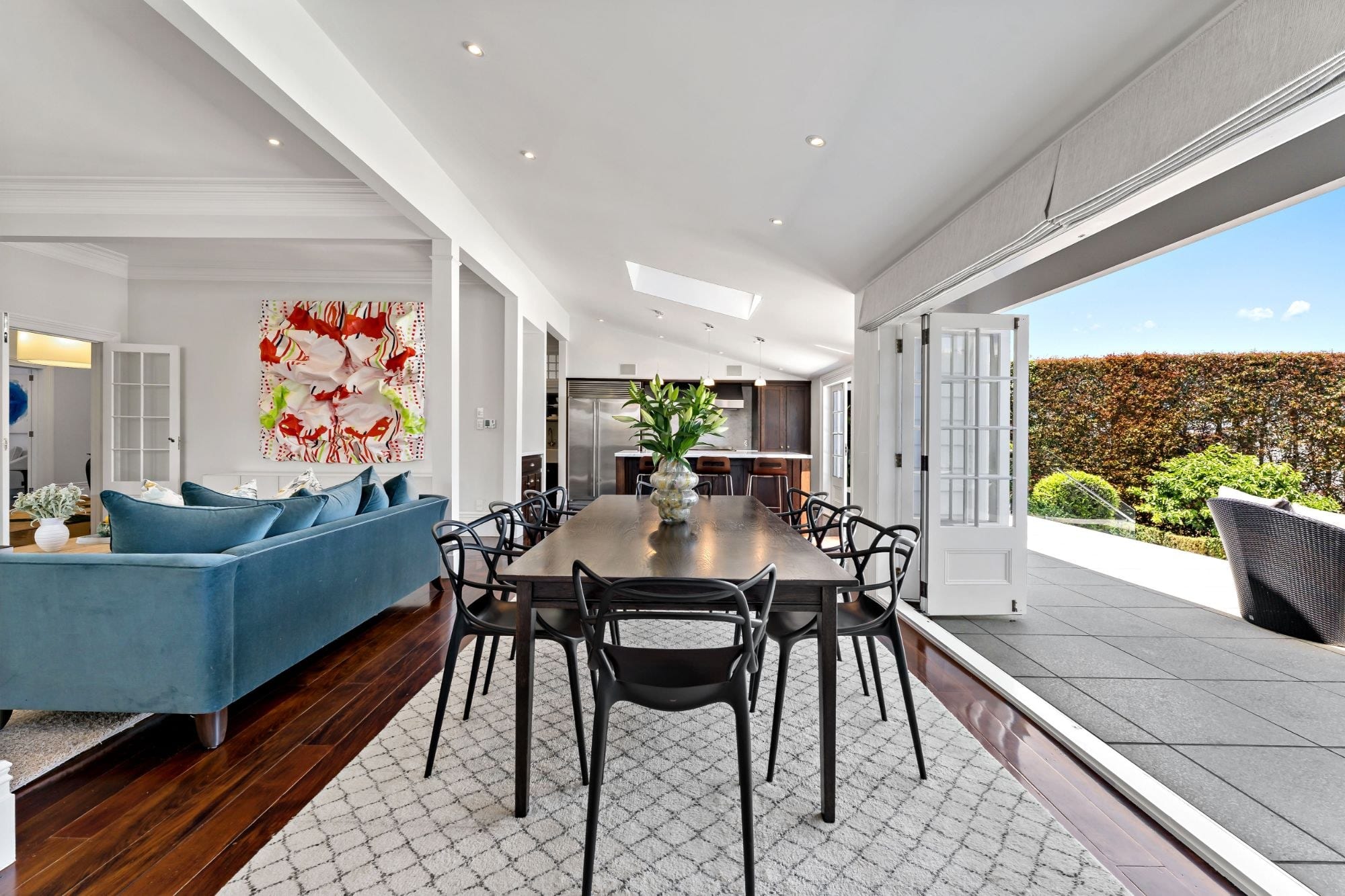 The dining room at 52 Bassett Road, opening to the terrace, market ready