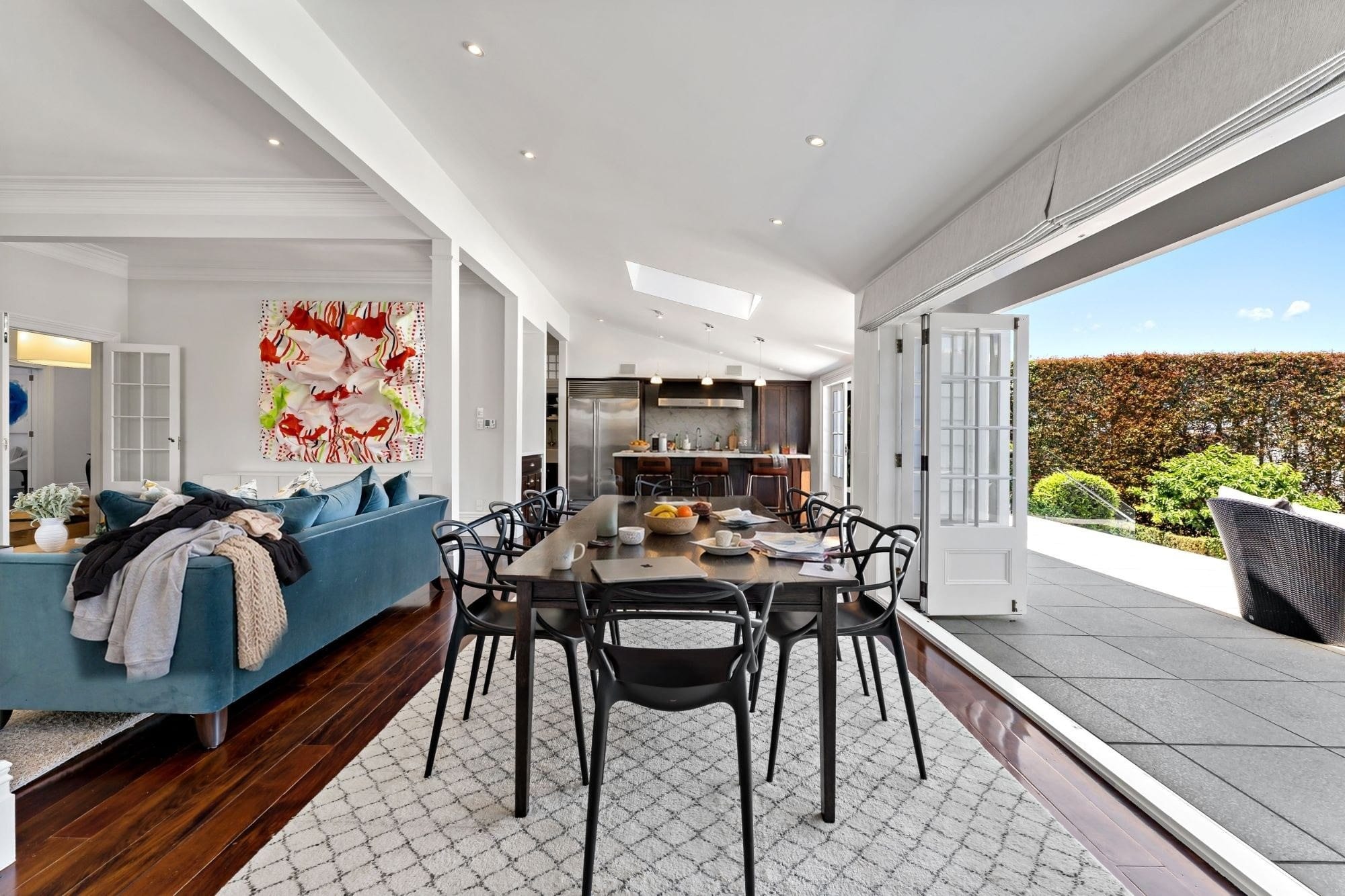 The dining room at 52 Bassett Road, opening to the terrace, market ready, before preparation
