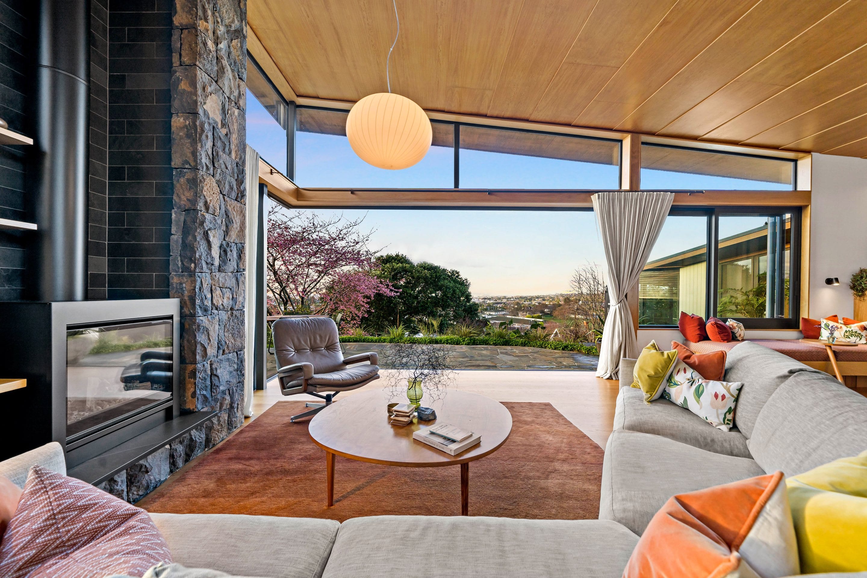 The living room at 33 Market Road, open to the evening sky